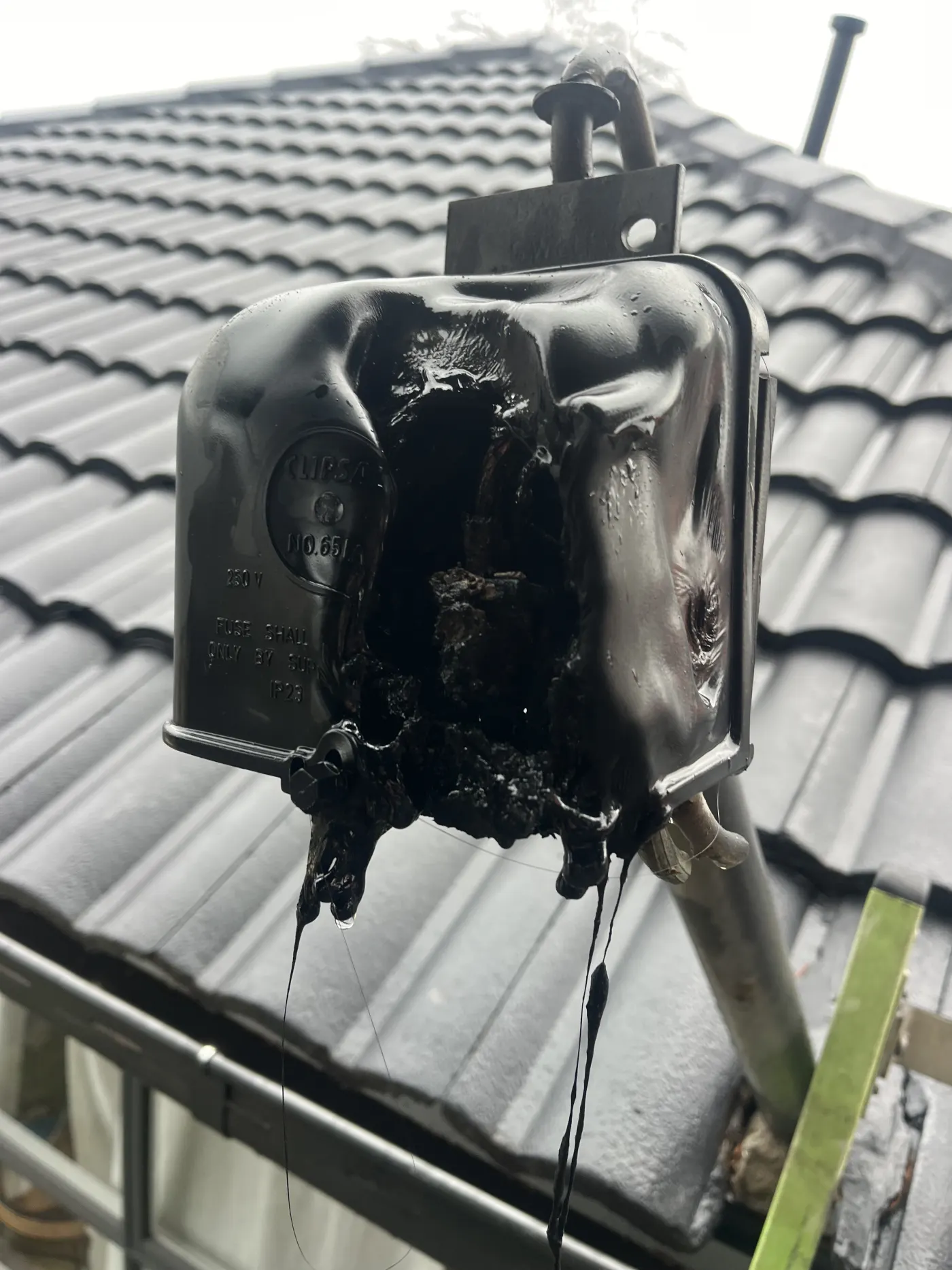 Burnt out service fuse removed during an emergency electrical callout