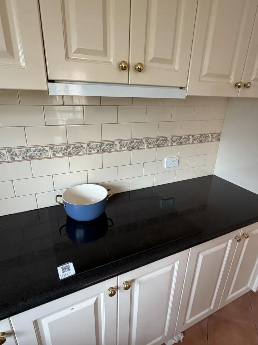 Induction cooktop installed in a Melbourne kitchen replacing a gas cooktop